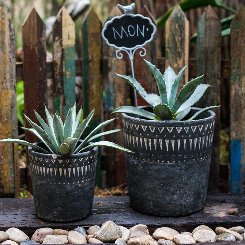 black concrete plant pot Black Pottery Cement Planter