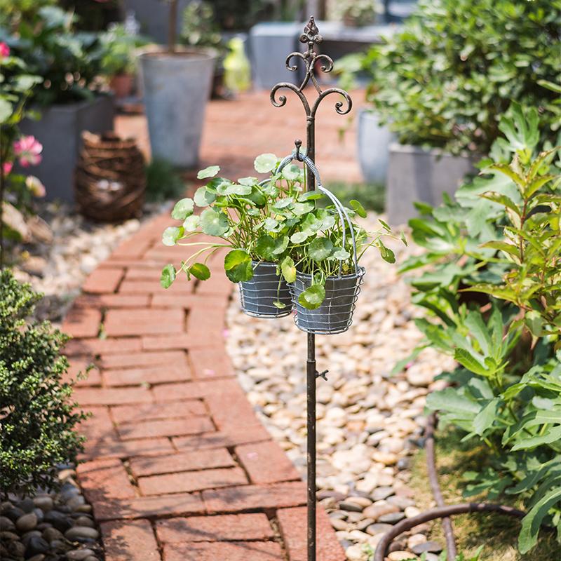 wrought iron planters plant stands hanging baskets Metal Hanging Plant Stand with Hook Adjustable Height – RusticReach